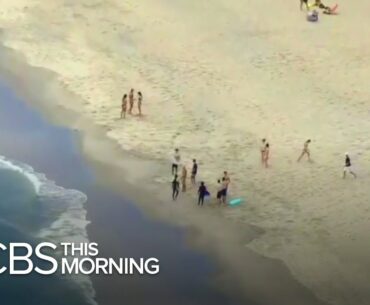 As warmer weather begins, American beaches prepare for surge amid COVID-19