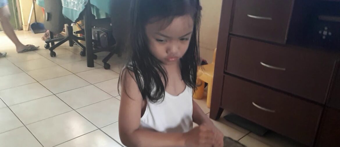 Grandchild give vitamin to opa