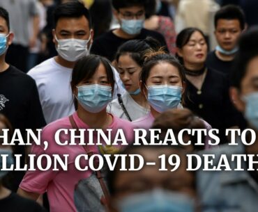 China’s Wuhan moves on as global coronavirus death toll passes 1 million