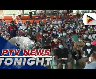 Sen. Go distributes cash aid, groceries, food packs, vitamins to Marikina residents