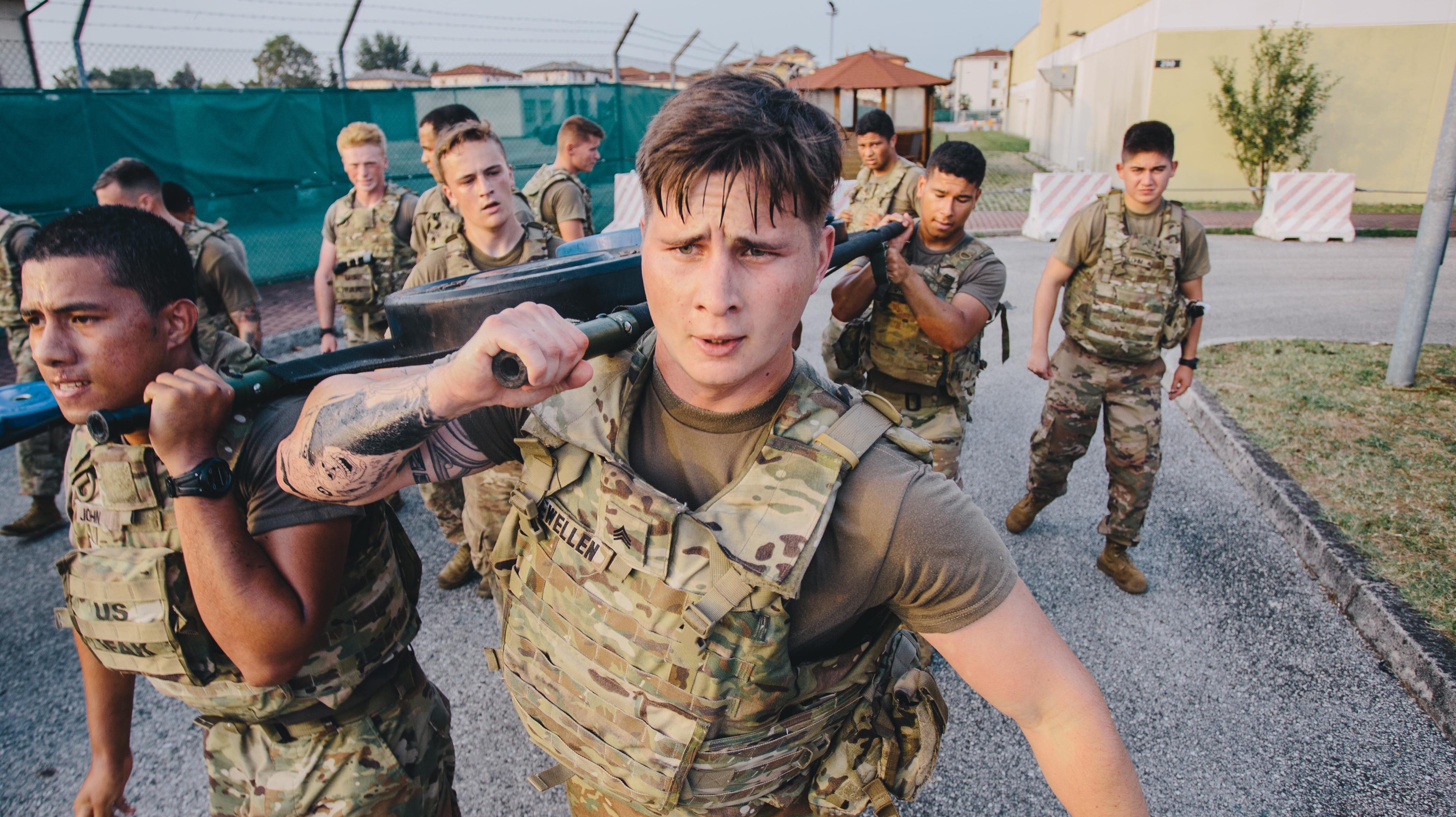 U.S. Army paratroopers of 1st Battalion, 503rd Infantry Regiment, 173rd Airborne Brigade compete in a physical training event designed to determine the most physically fit platoon in the battalion, July 30, 2019. The extremely competitive event, performed in IOTV and boots, consisted of several runs, LMTV tire flips, rope climbs, sandbag carries, relay sprints with accompanying weights, and sled drags. Each station added more and more equipment that each platoon had to carry with them past the finish line. After a grueling 4.6 miles, 1-503’s Attack Company emerged victoriously and took the battalion trophy. The 173rd Airborne Brigade is the U.S. Army’s Contingency Response Force in Europe, providing rapidly deployable forces to the United States Europe, Africa and Central Commands areas of responsibilities. Forward deployed across Italy and Germany, the brigade routinely trains alongside NATO allies and partners to build partnerships and strengthen the alliance.