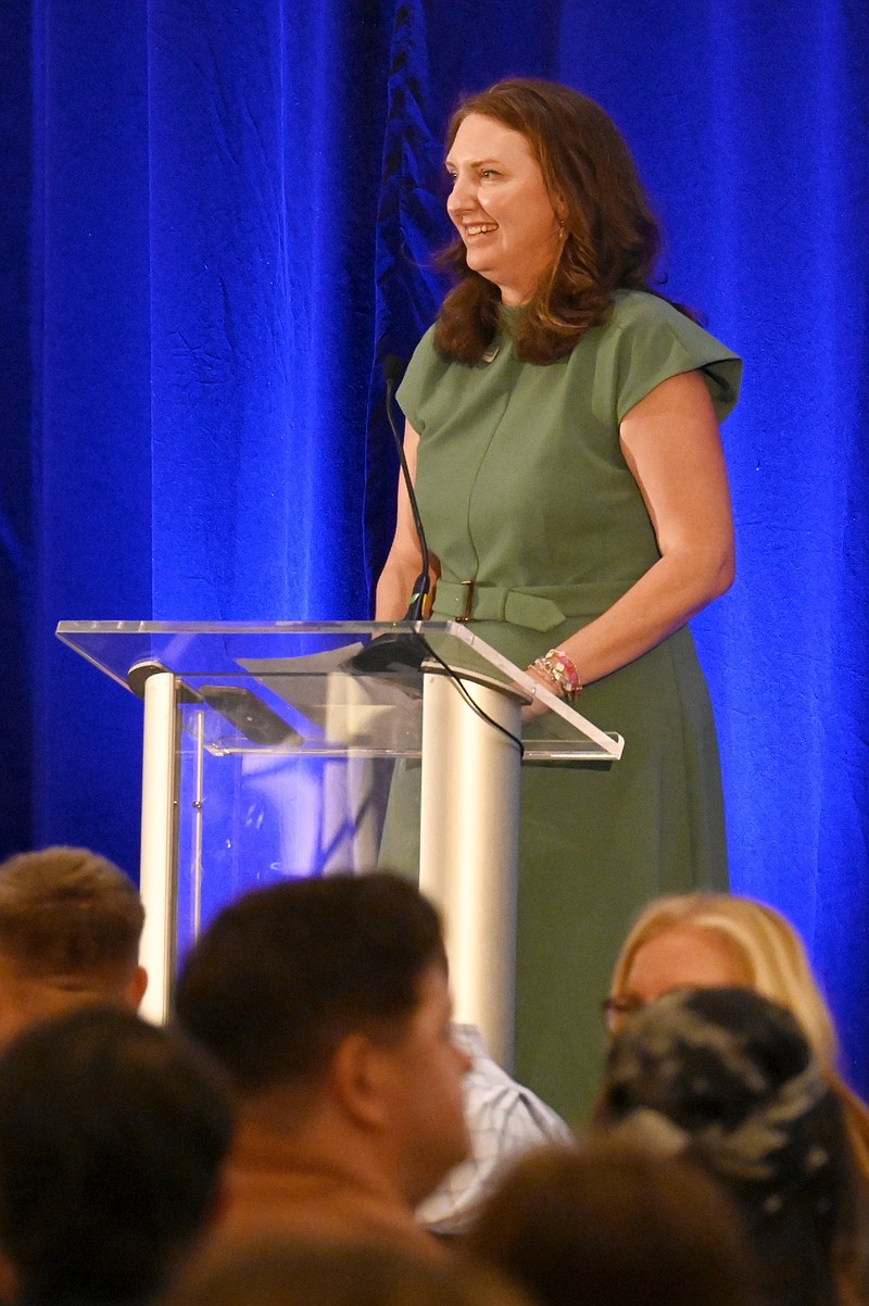Staff file photo / United Way of Chattanooga Vice President of Community Investments Abby Garrison speaks during a summit. The organization helped coordinate the region's response to a lapse in food aid funding during the federal government shutdown.