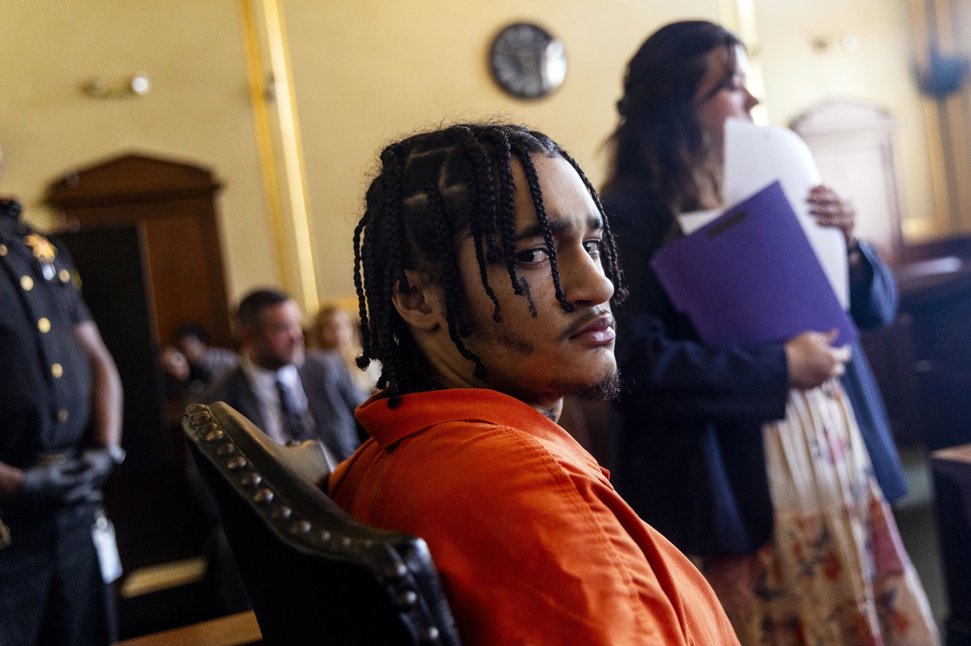 Tears well up in the eyes of Deaje Mayfield, 22, after Genesee County Circuit Judge B. Chris Christenson sentenced him and another man for their parts in killing Sheona Baker on Dec. 2, 2022 in Flint in the Gensee County Circuit Court on June 16, 2025 in downtown Flint. Mayfield, 22, and Zachary Edwards, 22, entered no contest and guilty pleas in their respective cases. Mayfield pleaded no contest to second-degree murder, two felony firearm charges, arson, tampering with evidence and carrying a concealed weapon. Edwards pleaded guilty to second-degree murder. Mayfield allegedly shot Baker with a shotgun and .40 caliber weapon multiple times on a dirt trail near 2420 Grand Traverse Street in Flint, according to testimony at Edwards’ preliminary examination. Jake May | MLive.com