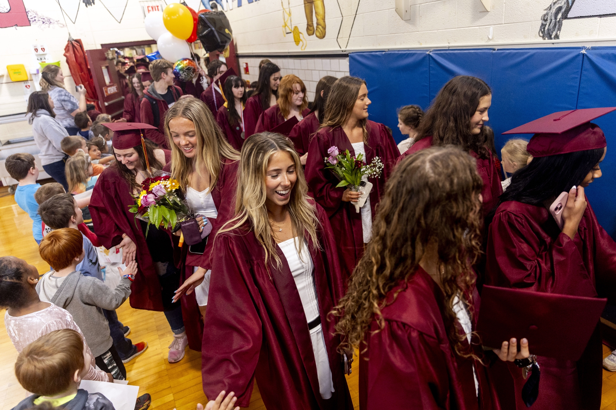 More than 375 Davison seniors parade up E. Clark Street and through Thomson Elementary School during the annual senior walk to celebrate the 2025 graduating class on Thursday, May 22, 2025 in Davison.
