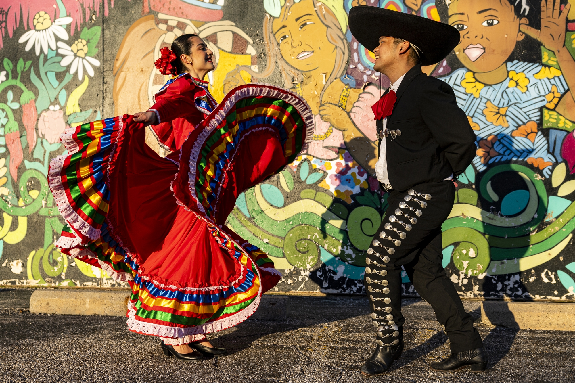 Alondra Rosas Ornelas and Alphonse Buclay during an El Ballet Folklórico Estudiantil dance rehearsal on Thursday, May 8, 2025, at Latinx Technology and Community Center in Flint.