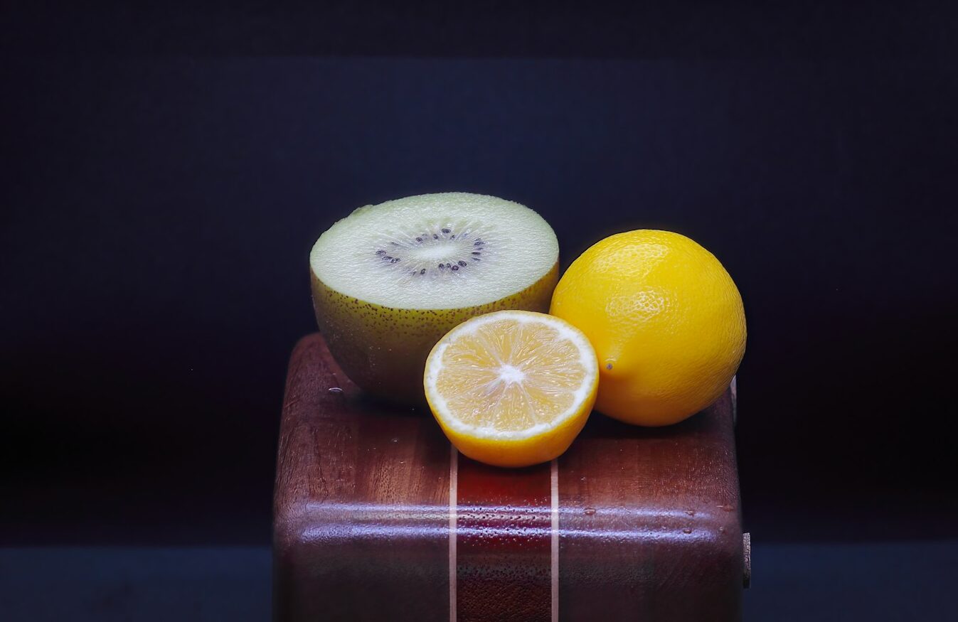 a piece of fruit sitting on top of a wooden box