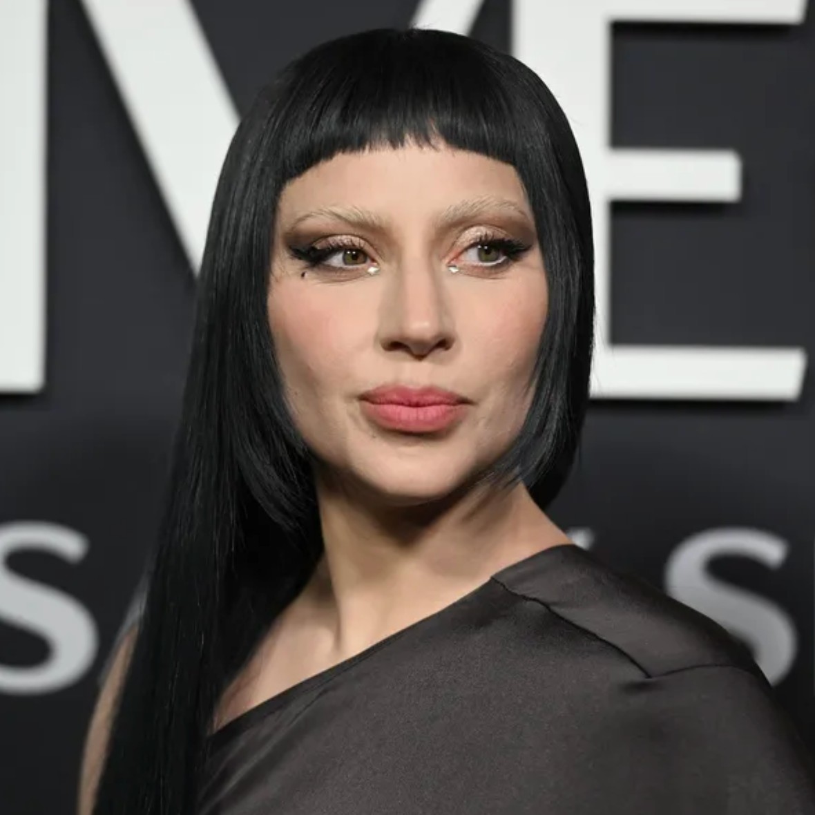 Lady Gaga wearing her hair styled in a jellyfish cut with micro bangs.
