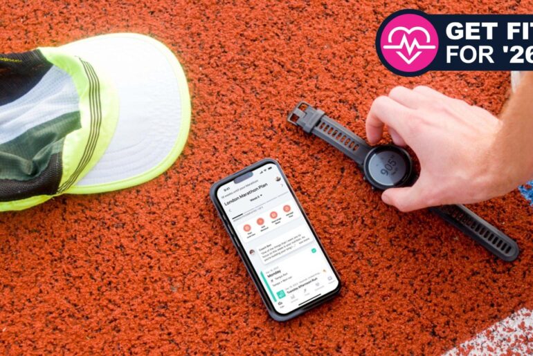 Runna app open on a phone, on a running track, with Get Fit for '26 logo