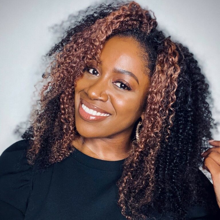 Hairstylist Brendnetta Ashley poses for a headshot.