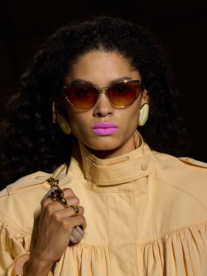 Chloé spring/summer 2026 beauty look from Fashion Week, featuring a neon pink lipstick