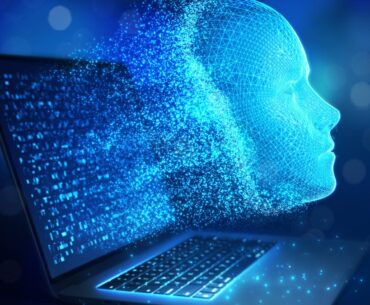 Hologram face coming out of a laptop screen