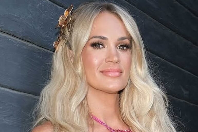 Carrie Underwood looks phenomenal in tiny shorts as she reveals secrets to toned physique