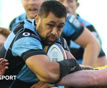 Taulupe Faletau drives forward against Dragons