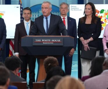 Human Services Secretary Robert F. Kennedy Jr. speaks during a press briefing with from left, Dr. Ben Carson, National Nutrition Advisor at U.S. Department of Agriculture, Dr. Marty Makary, Food and Drug Administration (FDA) commissioner, Dr. Mehmet Oz, administrator of the Centers for Medicare & Medicaid Services, Agriculture Secretary Brooke Rollins, and White House Press Secretary Karoline Leavitt, at the White House, Wednesday, Jan. 7, 2026, in Washington. (AP Photo/Evan Vucci)