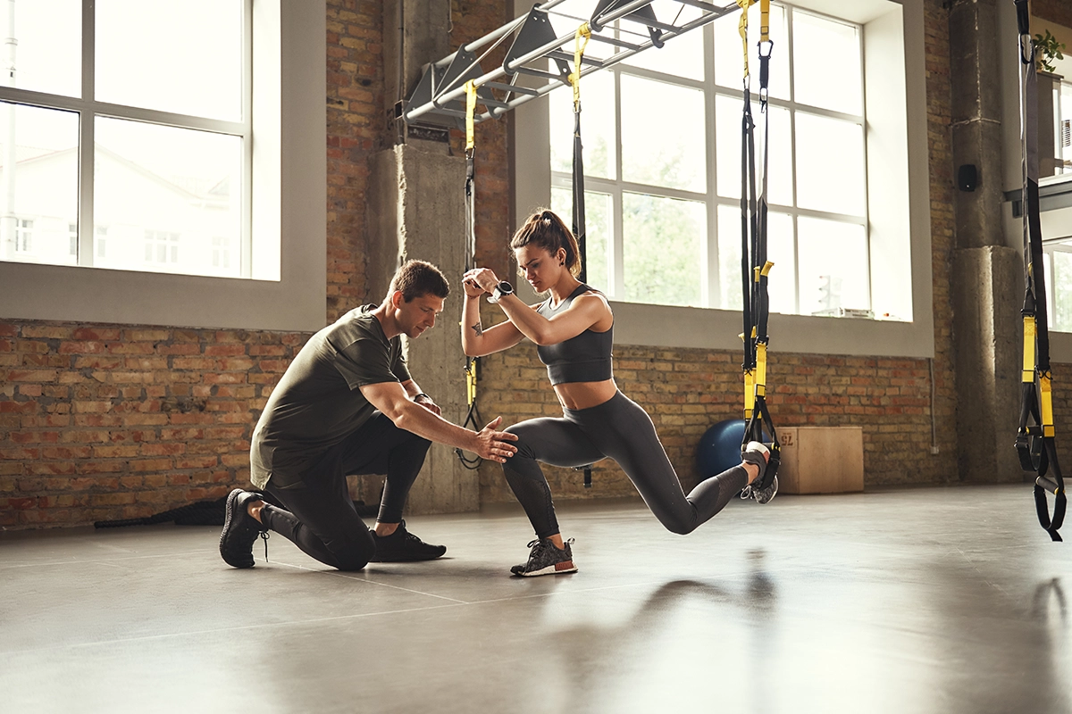 woman working out with trainer