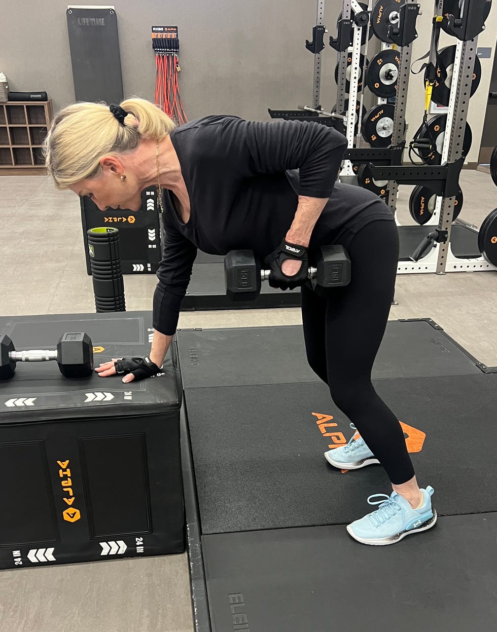 Individual performing a weightlifting exercise dena crews aloian workout