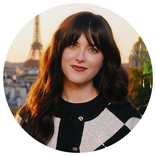 portrait with a view of the eiffel tower in the background