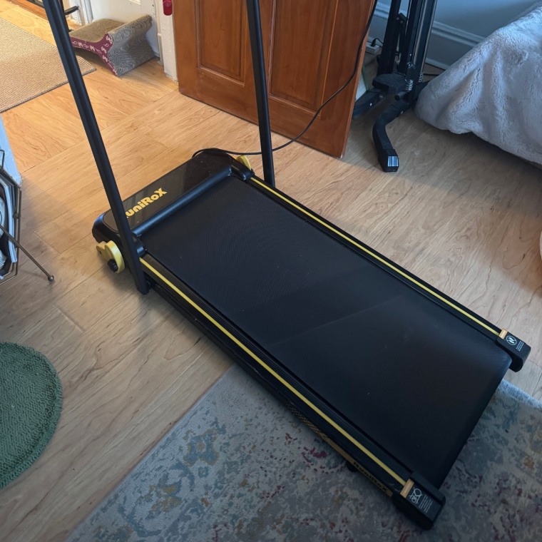 Image of the RuniRox Walking Pad in a living room.