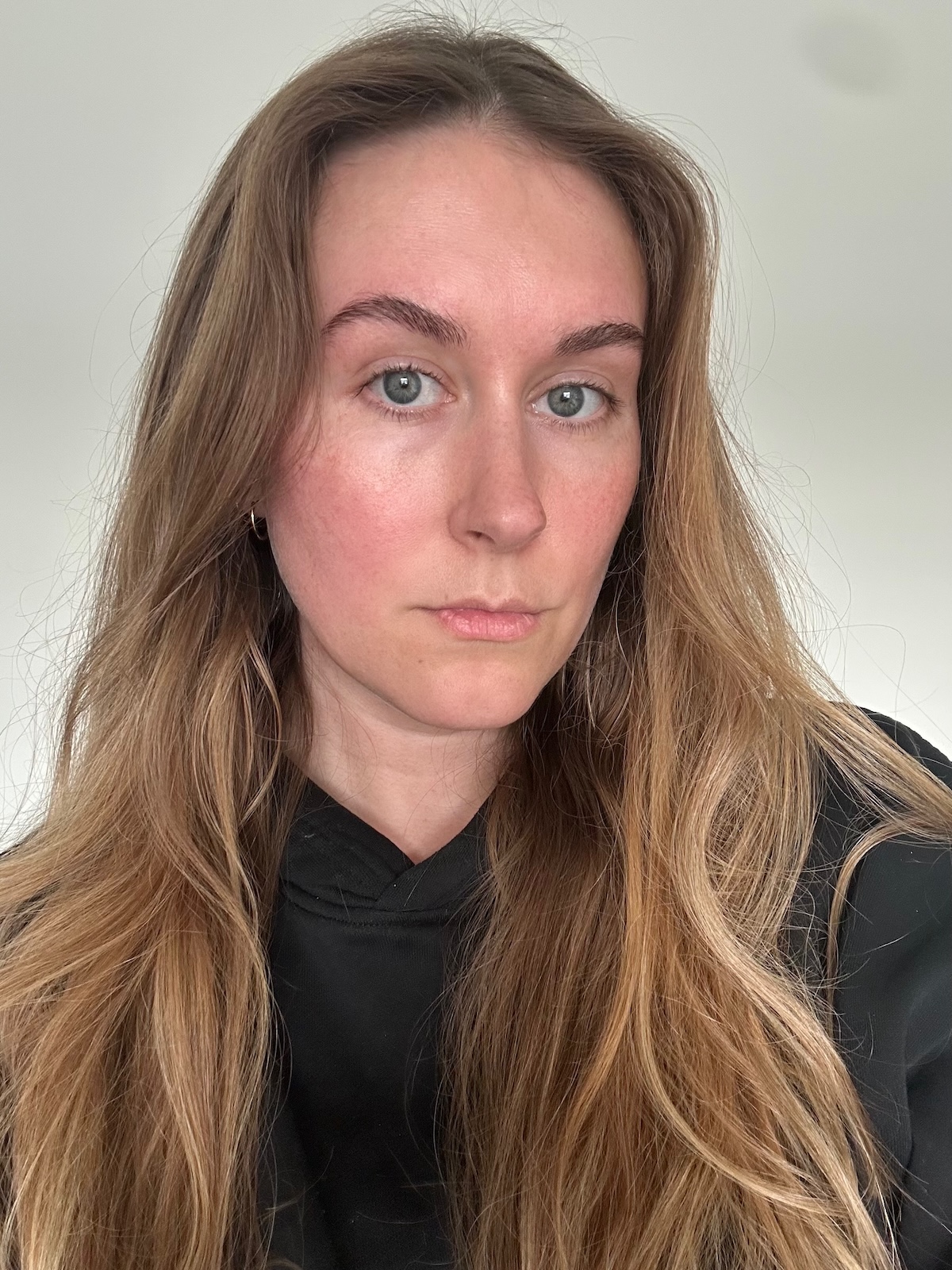 Beauty editor Kaitlyn McLintock before wearing Makeup by Mario SurrealSkin Foundation.