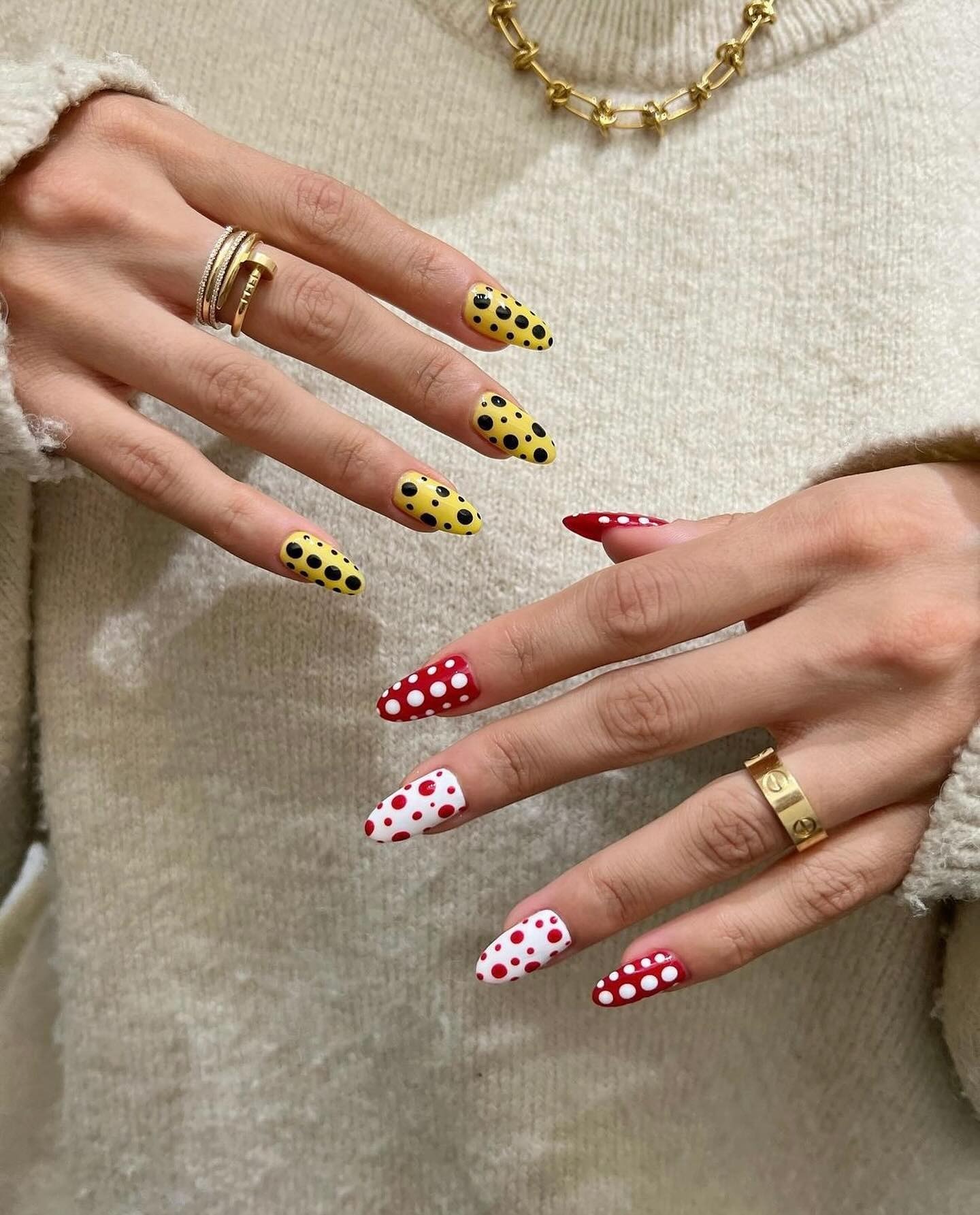 Mismatched polka dot nails.