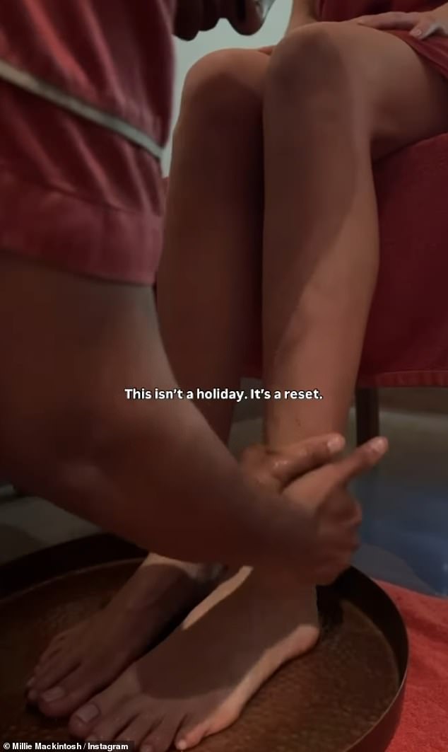 Millie has been documenting her stay on social media, stating the PR trip is 'not a holiday, it's a reset' designed to 'heal the nervous system'