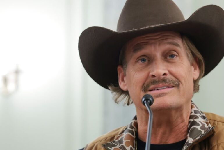 The National Desk dark theme brand icon