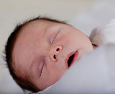 Close up of infants sleeping face