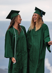 two people in caps and gowns