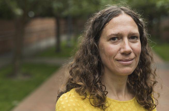 Photo of Kerry McMillen in a lovely yellow sweater