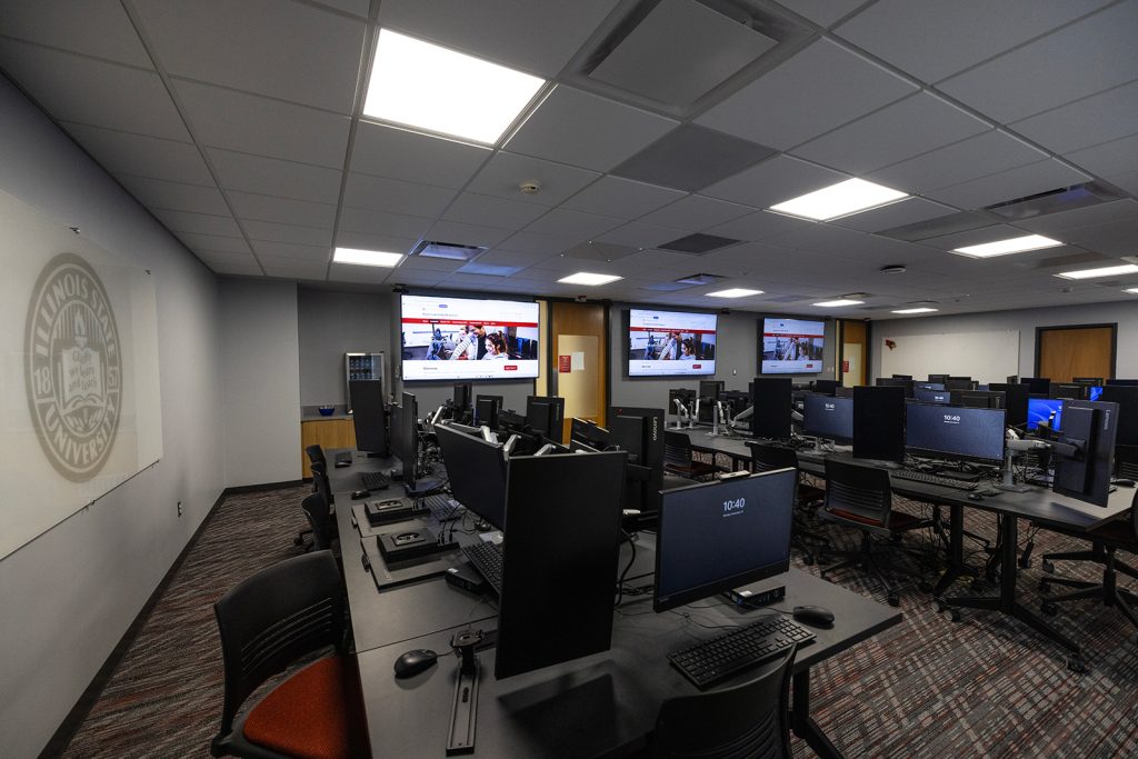 Lab with computers and large screens.