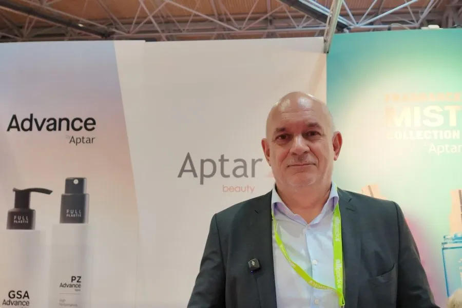 A man smiling into the camera.