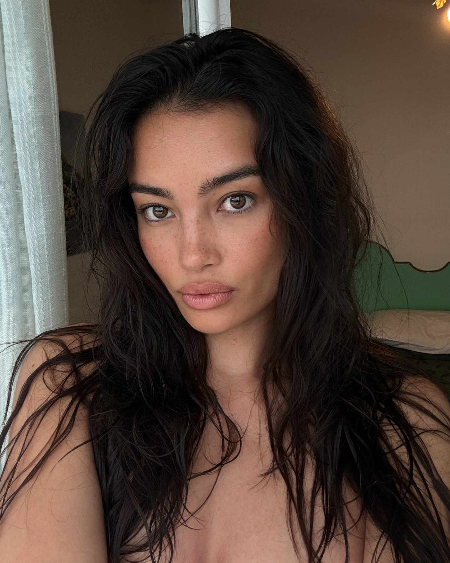 Kesley Merritt with a bronzed complexion and flushed cheeks