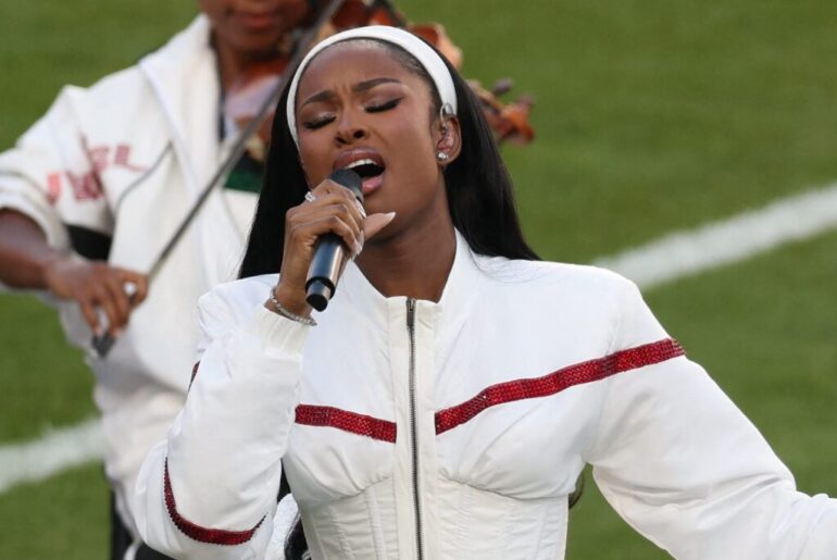 Coco Jones Channeled ‘90s Fine Beauty For Her Super Bowl Performance - Essence