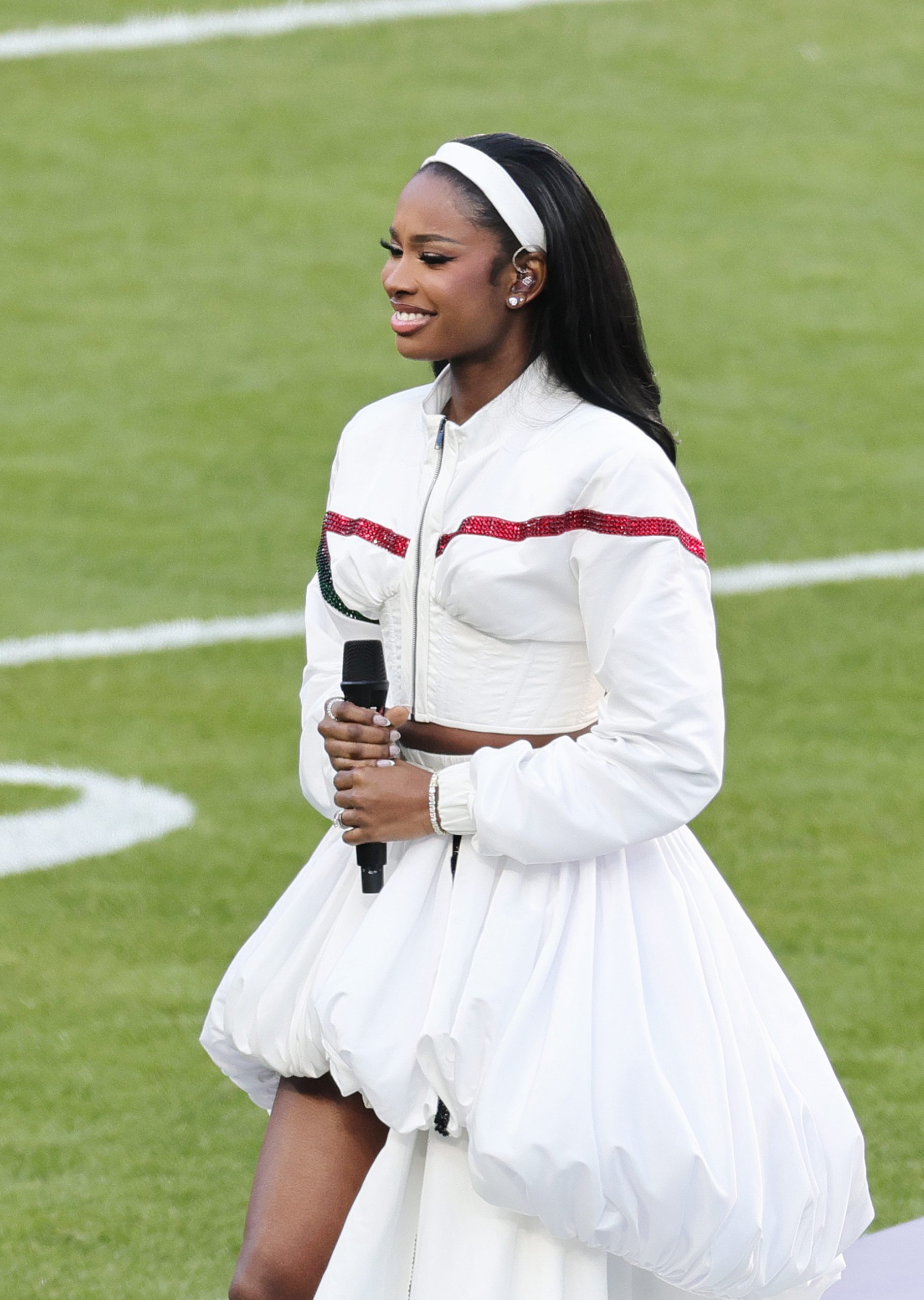Coco Jones Channeled ‘90s Fine Beauty For Her Super Bowl Performance