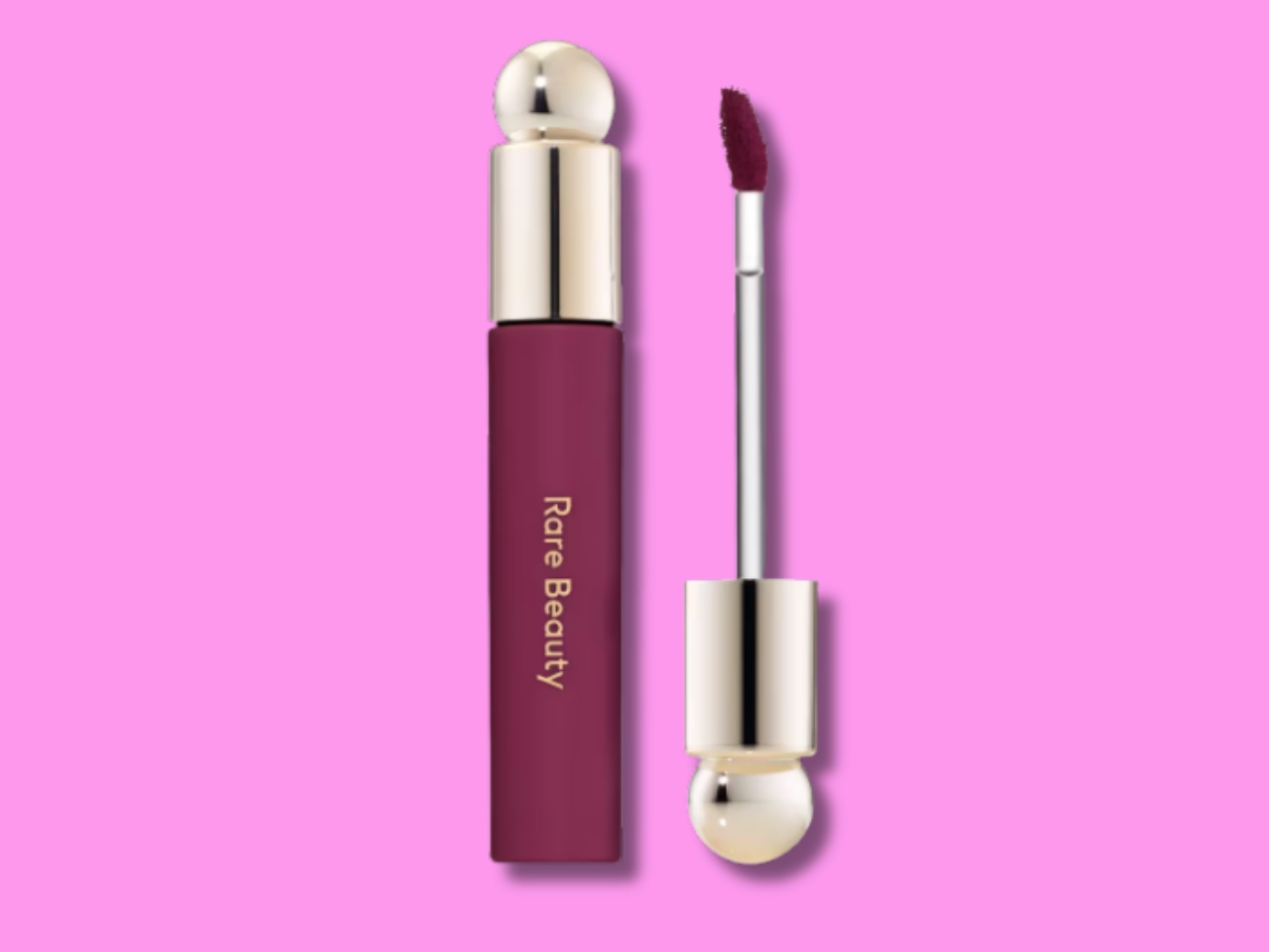 This image shows a A graphic of a Rare Beauty Tinted Lip Oil Stain in the Muted Berry shade.