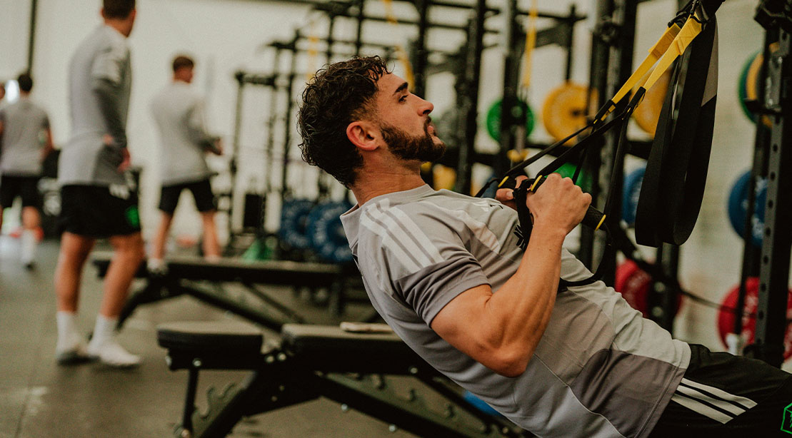MLS player Cristian Roldan training for the World Cup 2026 using TRX bands