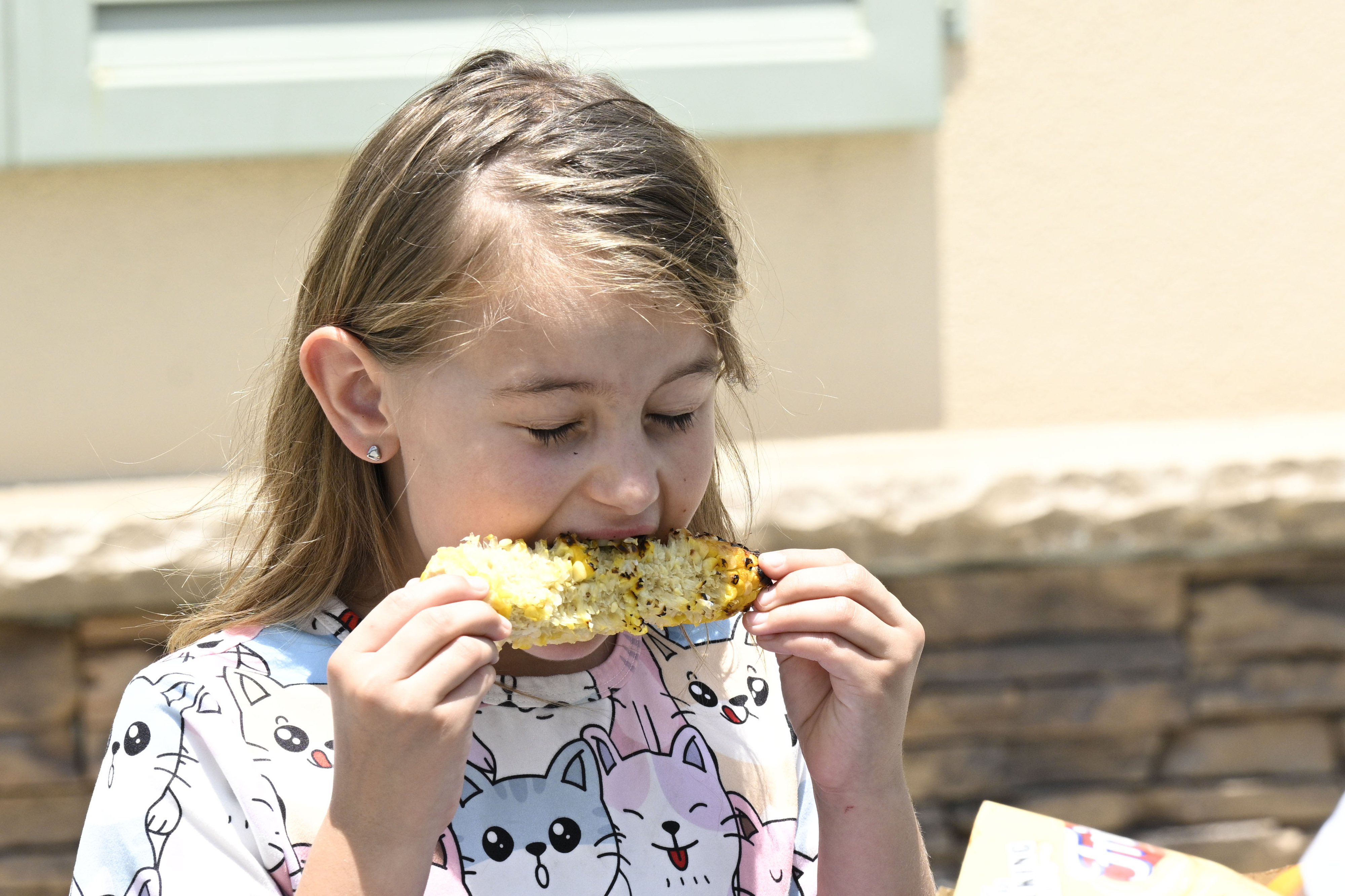 Julia Monheny enjoys her lunch Friday, June 7, 2024, during...