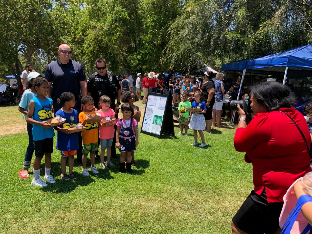 Children pose at a Redlands Unified School District summer meals...