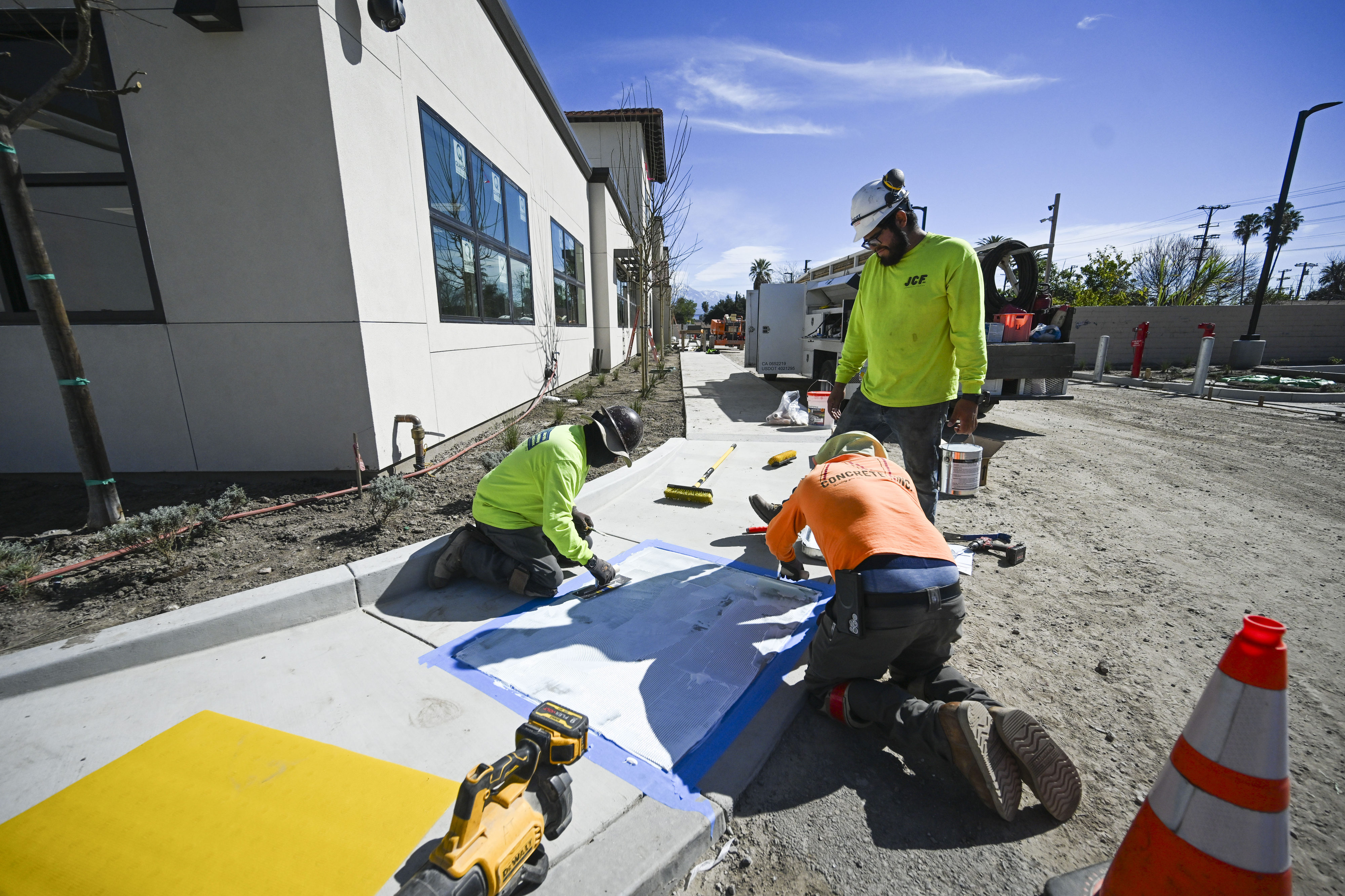 Construction crews work on the San Bernardino Community Wellness Campus...