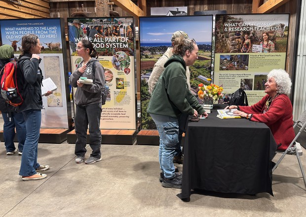 Author Marion Nestle signed books after her talk. Bookshop Santa Cruz partnered with the UC Santa Cruz Humanities Institute to make the event possible. (Shmuel Thaler - Santa Cruz Sentinel)