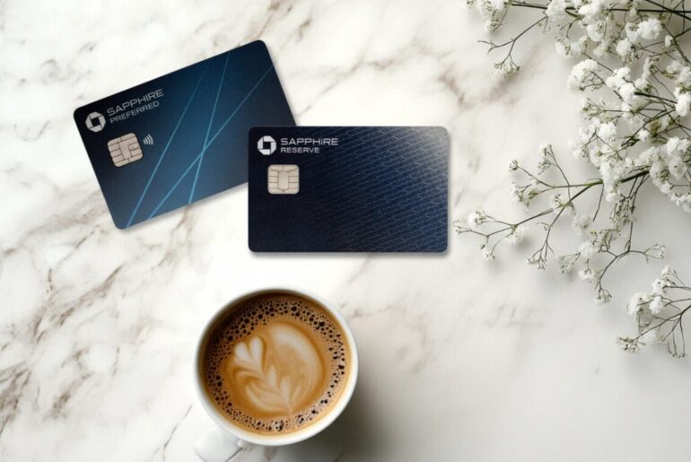 Sapphire cards with flowers and a cup of coffee on a table top.