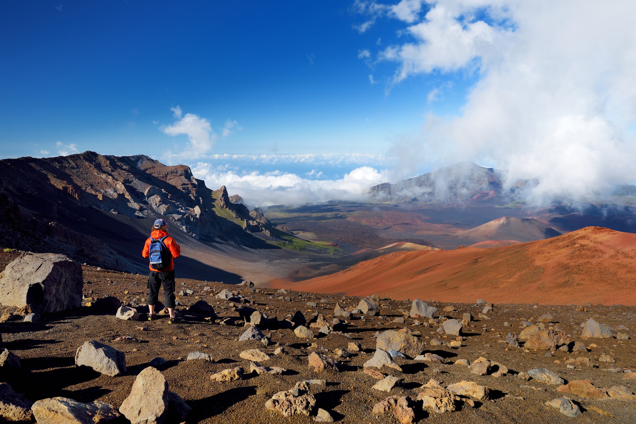 A tourist hiking in Haleakala Volcano crater, 10,023 feet above the Pacific Ocean