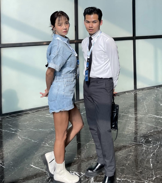 Muhammad Naufal Bin Omar poses for a photo with Glutanex ambassador actor Song Ji-hyo at an event for the cosmetics brand. [MUHAMMAD NAUFAL BIN OMAR]