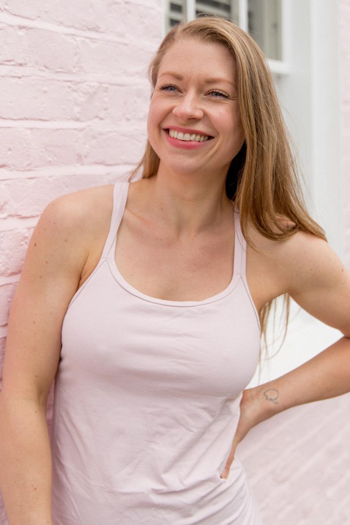 Beautiful woman smiling in a tank top