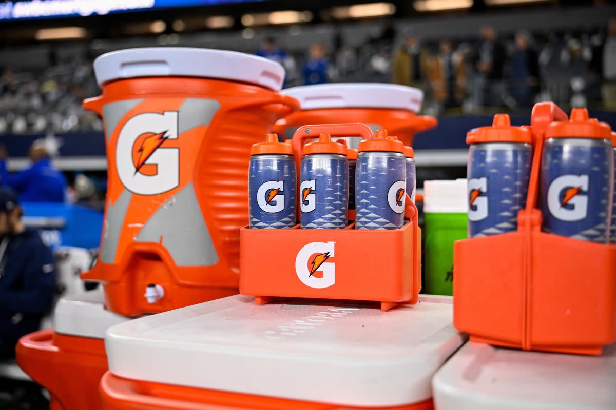 Gatorade bottles and coolers are seen on the sideline before an NFL football game between the Dallas Cowboys and the Minnesota Vikings, Dec. 14, 2025, in Arlington, Texas. (AP Photo/Jerome Miron, file) (Copyright 2025 The Associated Press. All rights reserved.)