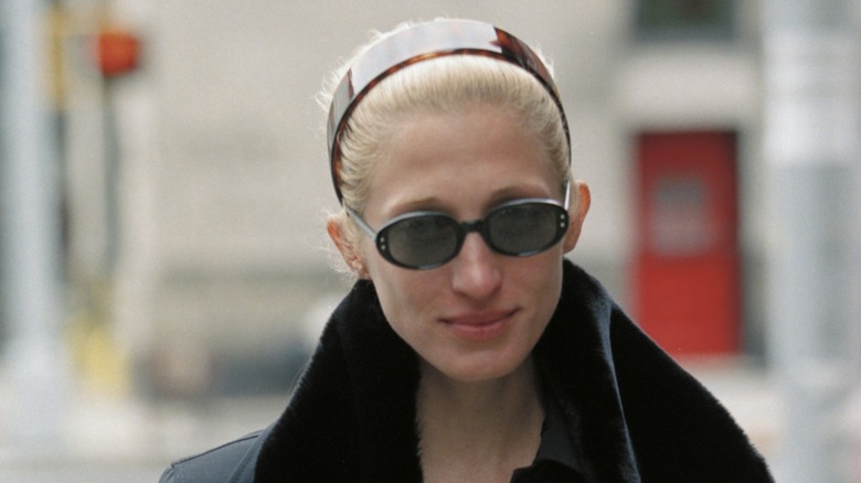 Carolyn Bessette-Kennedy is photographed taking a stroll with husband JFK Jr. near their TriBeCa loft in October 1997