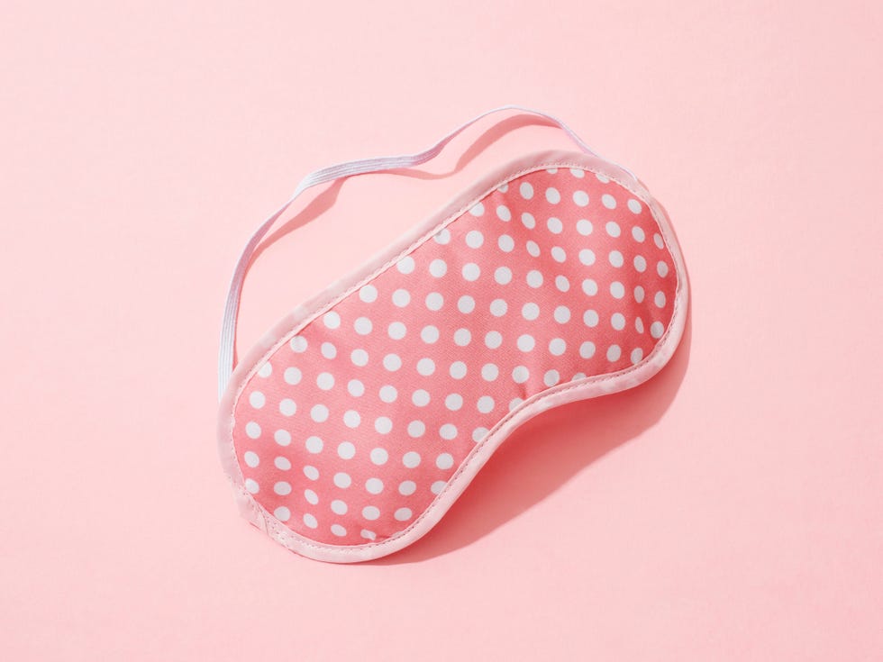 sleep mask on pink background.