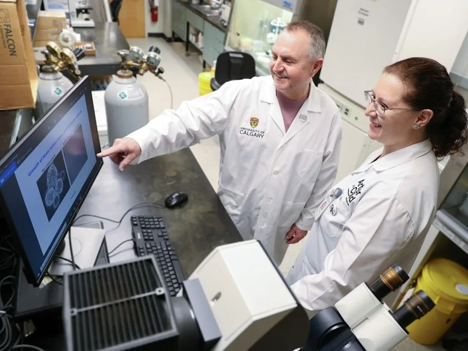  Patient and study participant Ed Waldner looks over scans with Dr. Gloria Roldan Urgoiti in a University of Calgary lab on Monday, February 9, 2026.