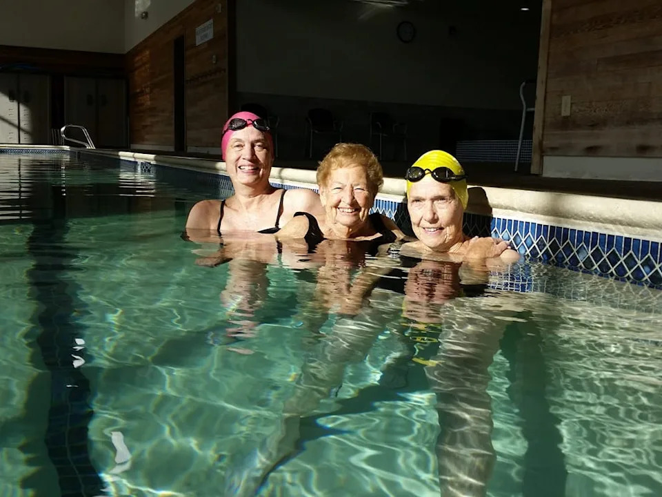 Cynthia Wall and her friends in the pool at her gym
