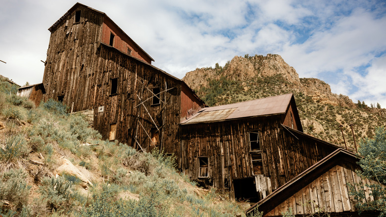 Wooden multi-story mill and mountain Bayhorse Idaho